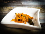 Nani's Achar Carrot and Mixed Veggies Pickle displayed on a white serving dish.